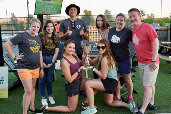 Neapolitan Labs team at Smash Park posing with competition trophy