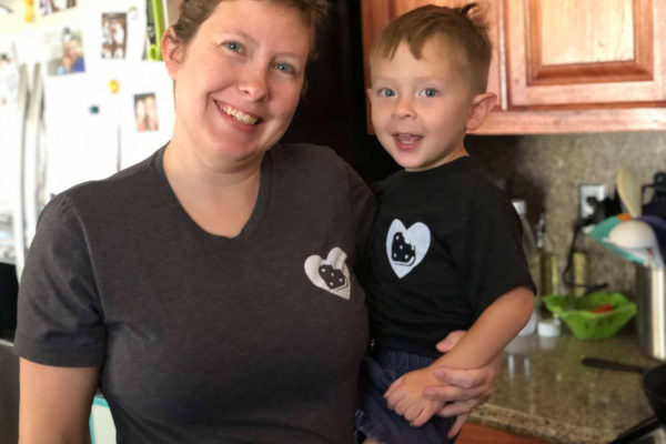 Our content and training specialist, Ashley, with her son, Cedric, in matching Neapolitan Labs shirts
