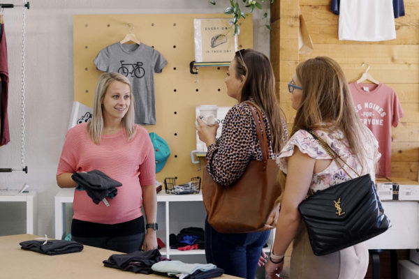 Picking out clothing at The Side Garage