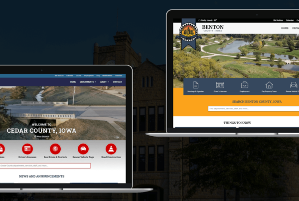 Cedar County and Benton County Iowa website homepages on laptops