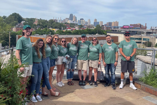 Neapolitan Labs team members on the roof of Boulevard Brewing looking out at Kansas City skyline.