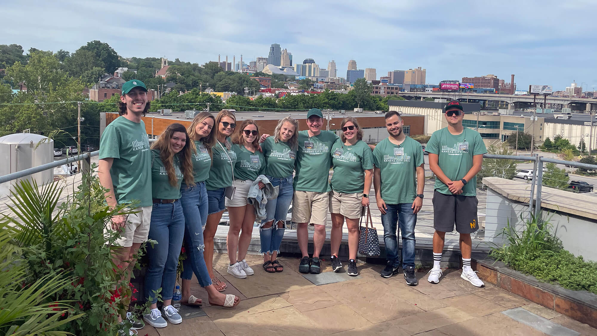 Neapolitan Labs team members on the roof of Boulevard Brewing looking out at Kansas City skyline.