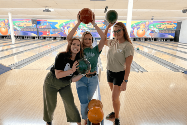 Neapolitan Labs team members take part in a bowling competition.