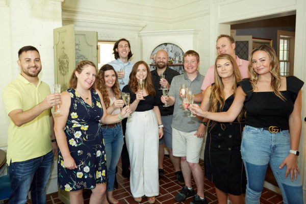 Neapolitan Labs team members toast to another successful year.