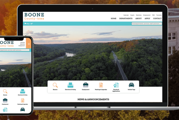 New Boone County website homepage on a laptop and phone.