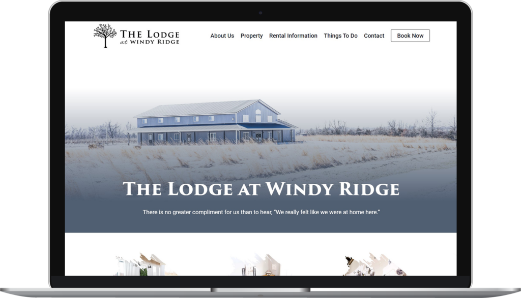 The Lodge at Windy Ridge website homepage on a laptop.