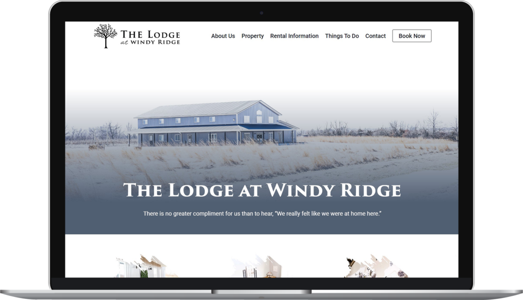 The Lodge at Windy Ridge website homepage on a laptop.