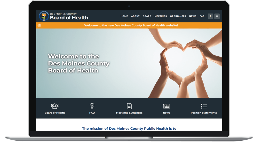 Des Moines County Board of Health website homepage on a laptop.