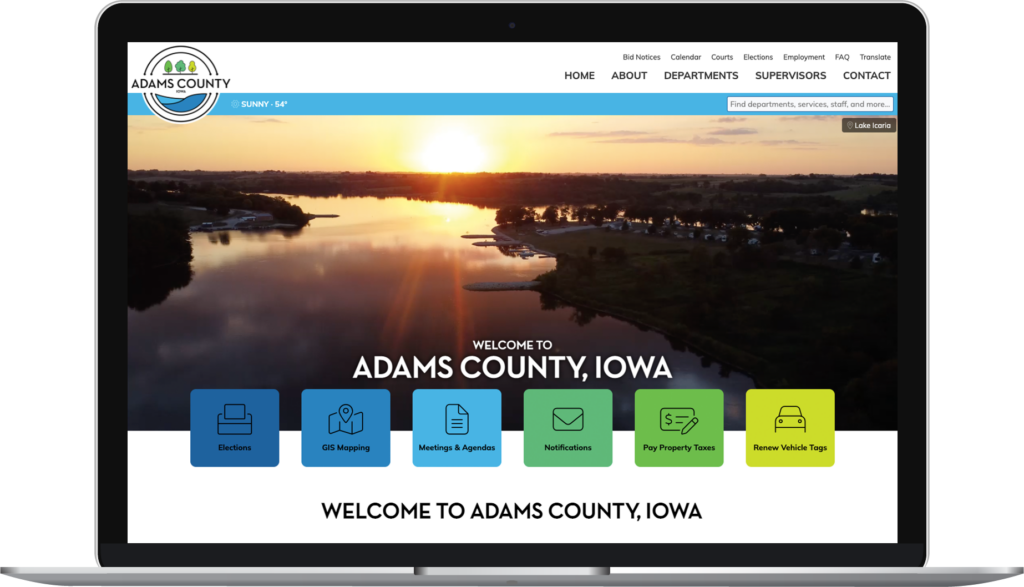 Adam County, Iowa, website homepage on a laptop.