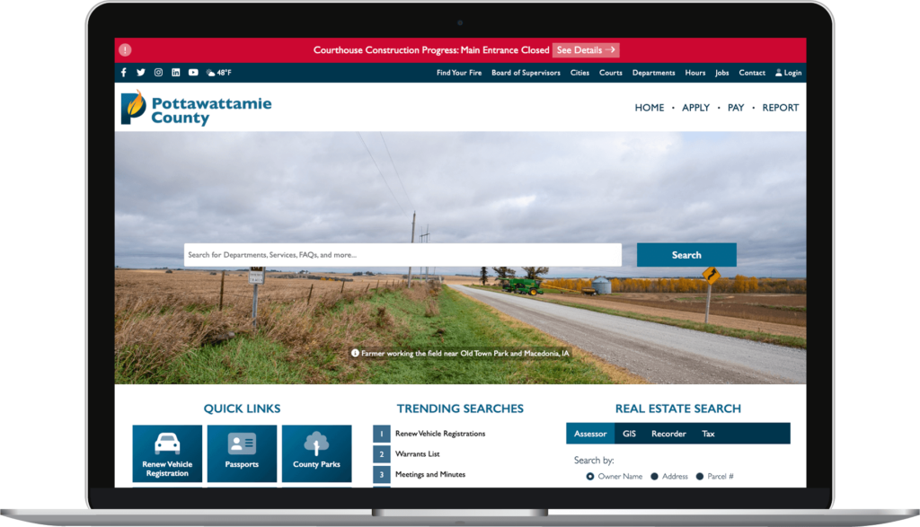 Pottawattamie County, Iowa, website homepage on laptop screen.