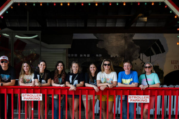 Neapolitan Labs team members in line for the Ye Old Mill ride at the Iowa State Fair.