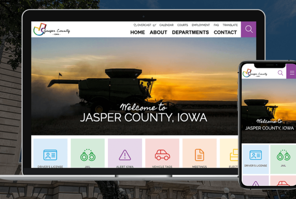 Jasper County, Iowa's, website homepage open on a laptop and mobile device.